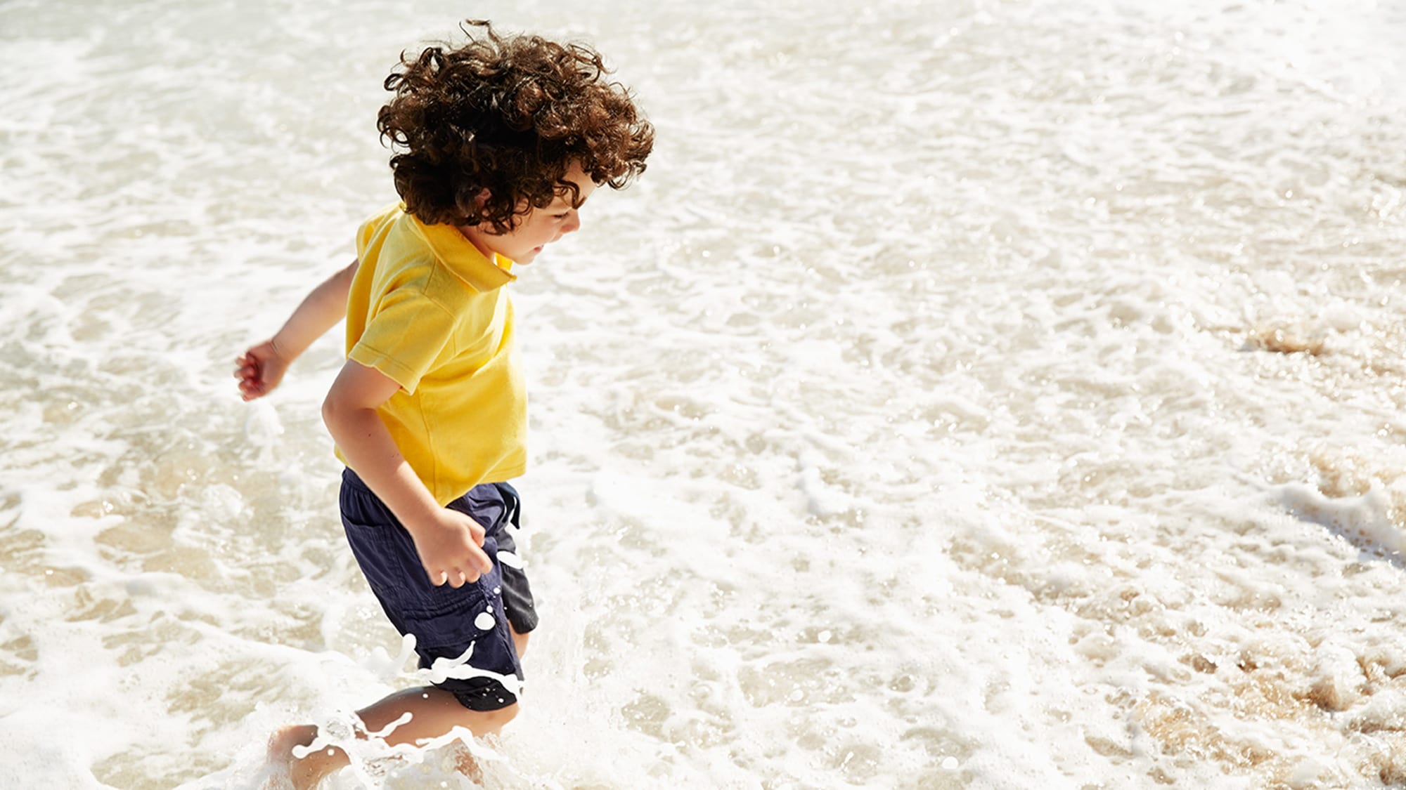 kid at the beach