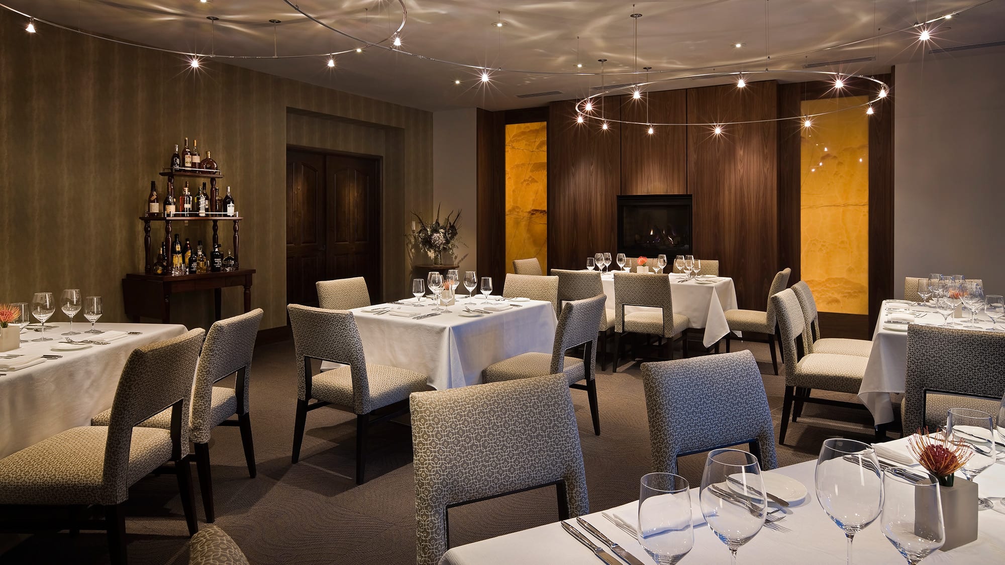 dim dining room with liquor table